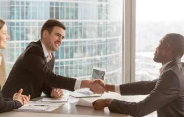 Horizontal,Photo,Diverse,Businesspeople,Gather,At,Modern,Office,Boardroom,,Black